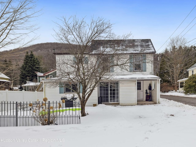 view of front of home with fence