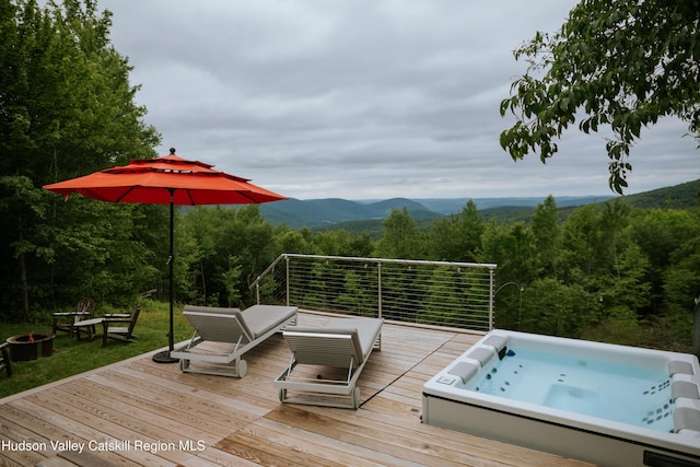 1199 W Highland Rd, Hobart, NY 13788 - deck featuring a wooded view, an outdoor fire pit, and a mountain view