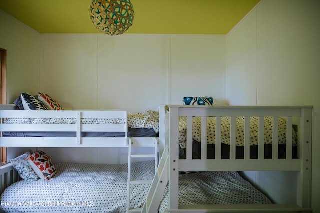 1199 W Highland Rd, Hobart, NY 13788 - bedroom featuring a decorative wall
