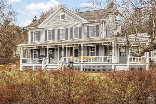 1301 County Route 7, Ancram, NY 12502 - victorian home with a porch and roof with shingles