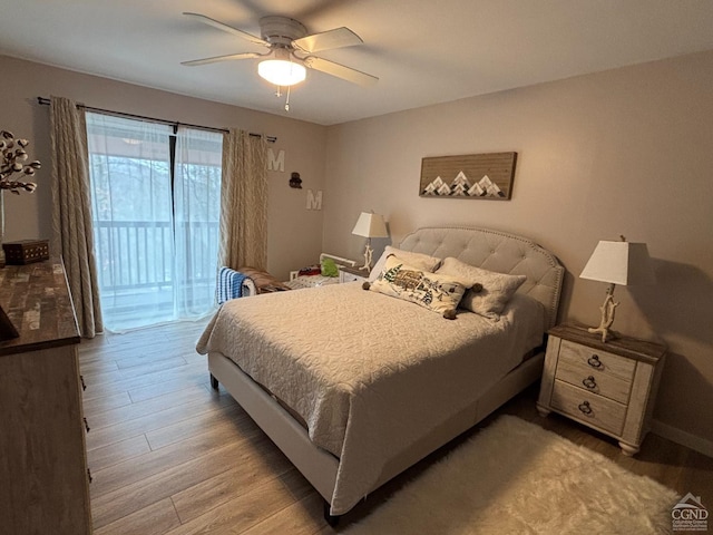23 Townhouse Ln Unit D 1, Windham, NY 12496 - bedroom featuring access to outside, light wood-type flooring, and ceiling fan