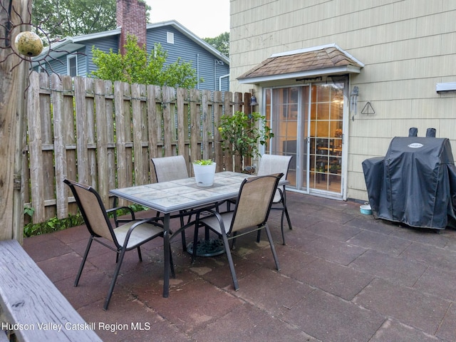 65 Lamb Ave, Saugerties, NY 12477 - view of patio with outdoor dining area and a grill