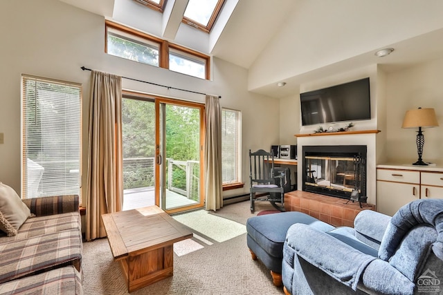 91 Windham Ridge Rd Unit 18B, Windham, NY 12496 - carpeted living room featuring high vaulted ceiling, a tile fireplace, and a skylight