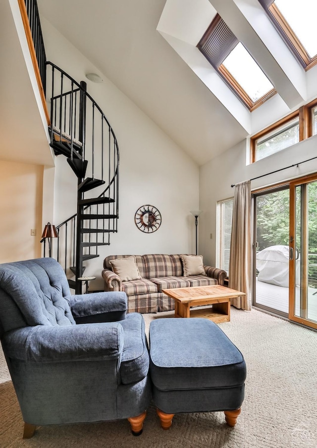 91 Windham Ridge Rd Unit 18B, Windham, NY 12496 - living area with high vaulted ceiling, carpet flooring, a skylight, and stairs