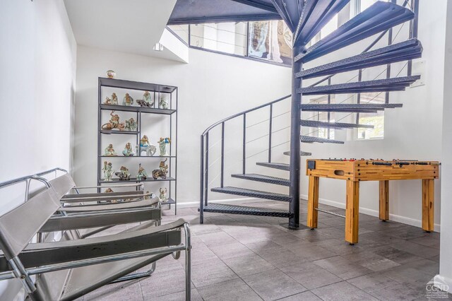 219 Sleepy Hollow Rd, Athens, NY 12015 - staircase with baseboards and a high ceiling