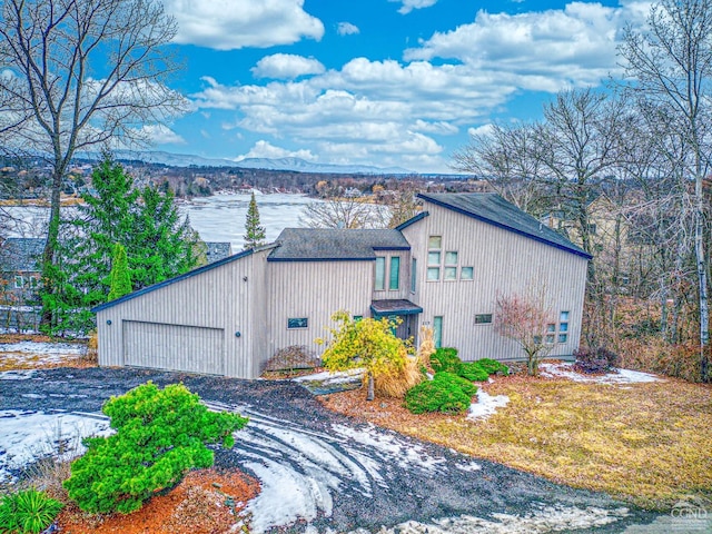219 Sleepy Hollow Rd, Athens, NY 12015 - view of home's exterior with a garage and a mountain view