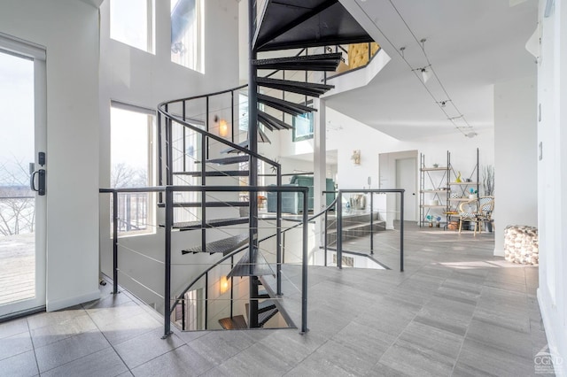219 Sleepy Hollow Rd, Athens, NY 12015 - stairs with healthy amount of natural light and a high ceiling