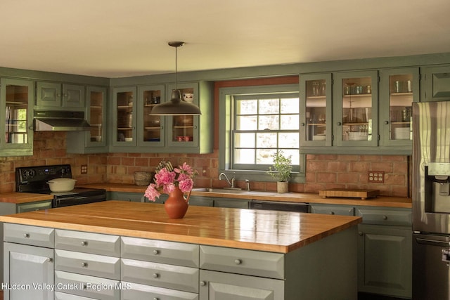 19 Dug Rd, Accord, NY 12404 - kitchen featuring under cabinet range hood, black range with electric cooktop, butcher block counters, stainless steel fridge with ice dispenser, and tasteful backsplash