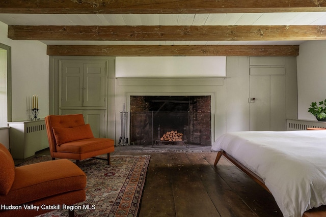 19 Dug Rd, Accord, NY 12404 - bedroom featuring beamed ceiling, hardwood / wood-style flooring, radiator, and a fireplace with flush hearth