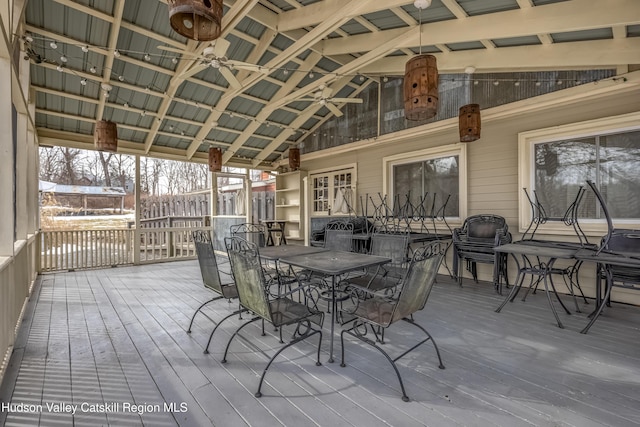 deck with a ceiling fan and outdoor dining space