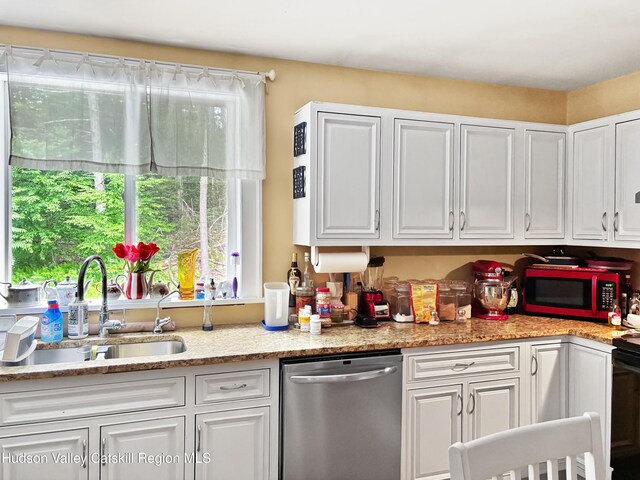 40-67 Popstone Rd, Stone Ridge, NY 12484 - kitchen with dishwasher, white cabinetry, and plenty of natural light