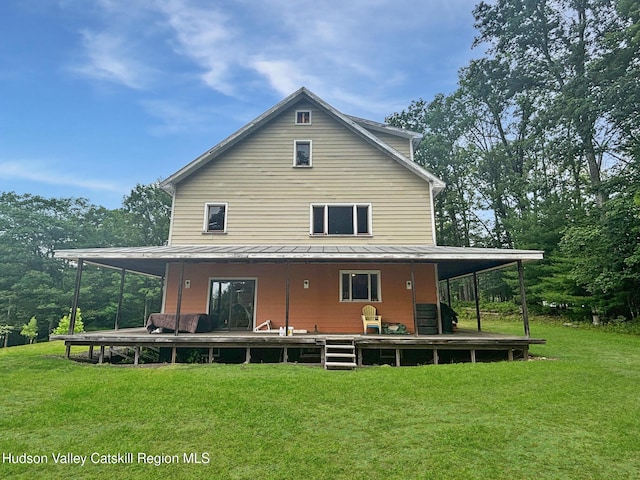 40-67 Popstone Rd, Stone Ridge, NY 12484 - back of house featuring a yard, a standing seam roof, and a metal roof