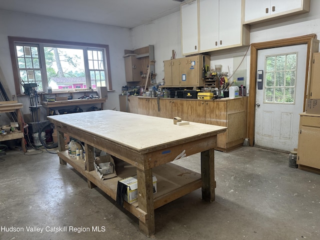 40-67 Popstone Rd, Stone Ridge, NY 12484 - dining area with a workshop area and concrete floors