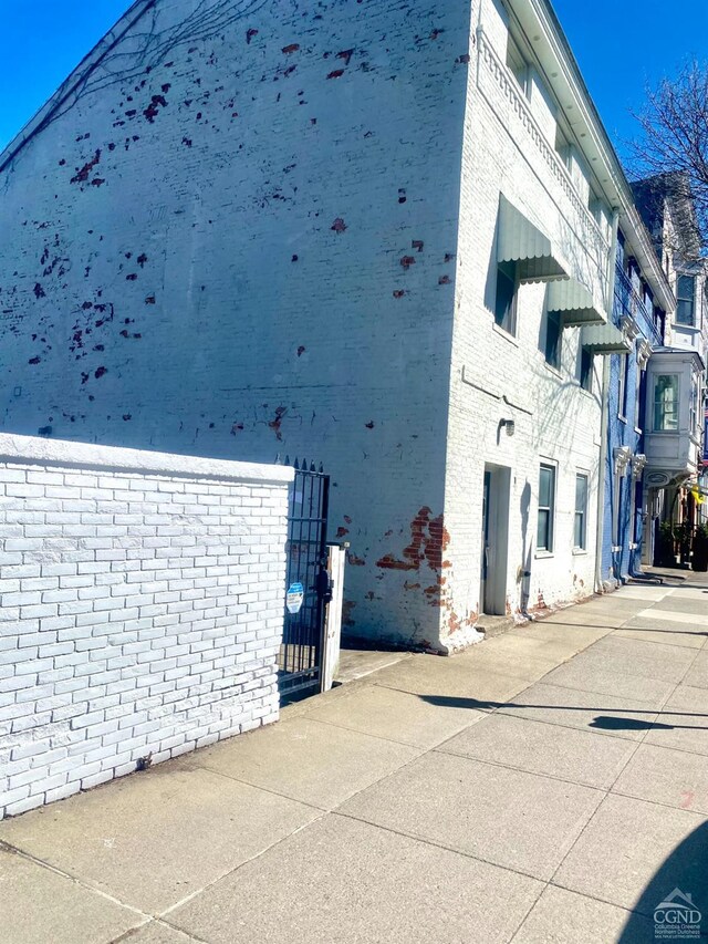 330-336 Warren, Hudson, NY 12534 - view of side of property with brick siding