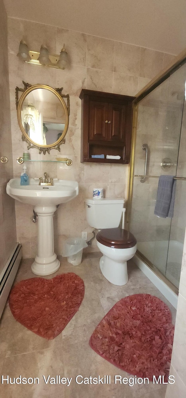 5320 Rte 23, Windham, NY 12496 - full bath featuring baseboard heating, a shower stall, and tile walls