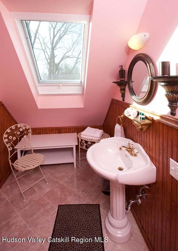 5320 Rte 23, Windham, NY 12496 - bathroom with tile patterned flooring and a skylight
