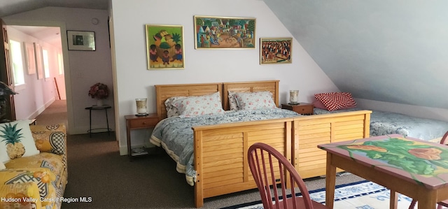 5320 Rte 23, Windham, NY 12496 - bedroom with lofted ceiling and carpet flooring