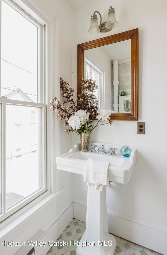 225 Robinson St, Hudson, NY 12534 - bathroom with plenty of natural light and tile patterned floors