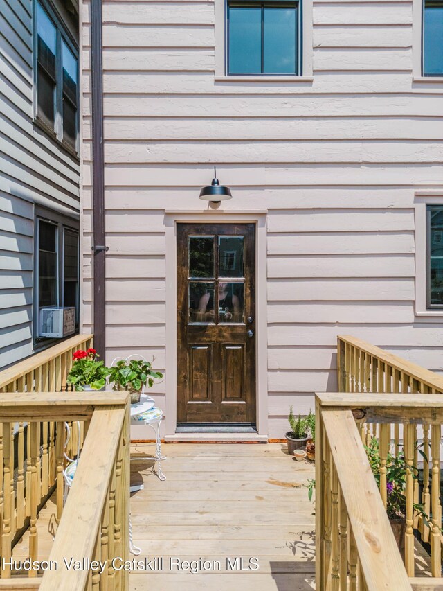 225 Robinson St, Hudson, NY 12534 - property entrance with a deck
