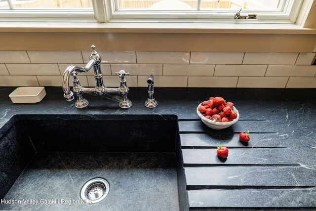 225 Robinson St, Hudson, NY 12534 - detailed view of backsplash and dark countertops