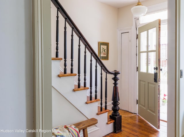 225 Robinson St, Hudson, NY 12534 - foyer with hardwood / wood-style flooring and stairway