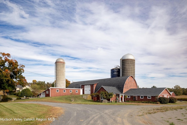 1030 County Route 27a, Ancram, NY 12502 - view of property featuring curved driveway and a barn