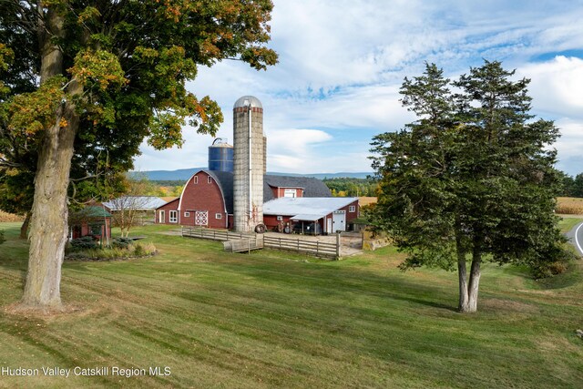 1030 County Route 27a, Ancram, NY 12502 - view of grassy yard featuring a barn and an outdoor structure
