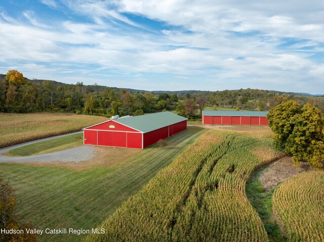 1030 County Route 27a, Ancram, NY 12502 - aerial view of property and surrounding area featuring a heavily wooded area