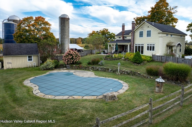 1030 County Route 27a, Ancram, NY 12502 - view of swimming pool with an outdoor structure and a patio