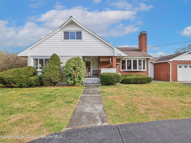 view of front of home with a porch and a front lawn