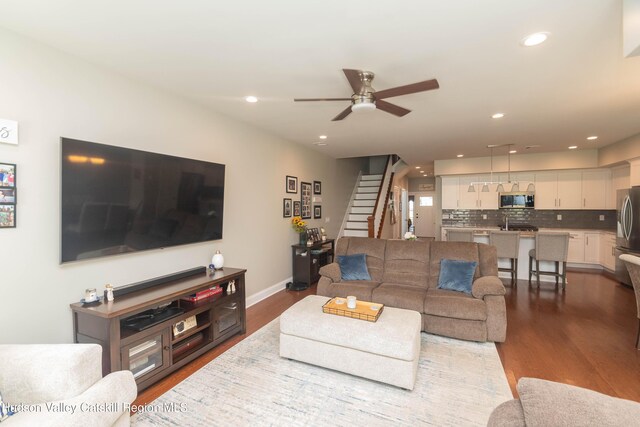 208 Hudson View Ter, Hyde Park, NY 12538 - living room with dark wood-type flooring, stairs, ceiling fan, and recessed lighting