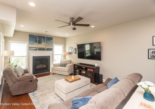 208 Hudson View Ter, Hyde Park, NY 12538 - living room featuring ceiling fan, healthy amount of natural light, a glass covered fireplace, wood finished floors, and recessed lighting