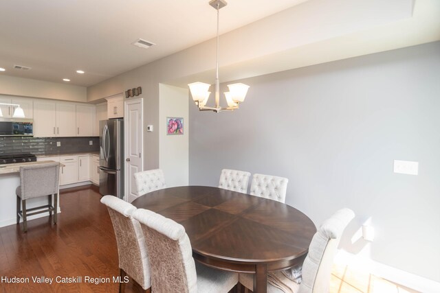 208 Hudson View Ter, Hyde Park, NY 12538 - dining area with a chandelier, dark wood finished floors, and recessed lighting