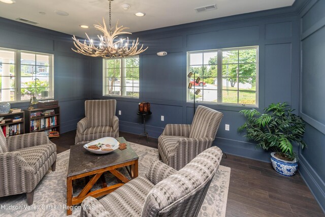 208 Hudson View Ter, Hyde Park, NY 12538 - living area with a decorative wall, a chandelier, wood finished floors, and recessed lighting