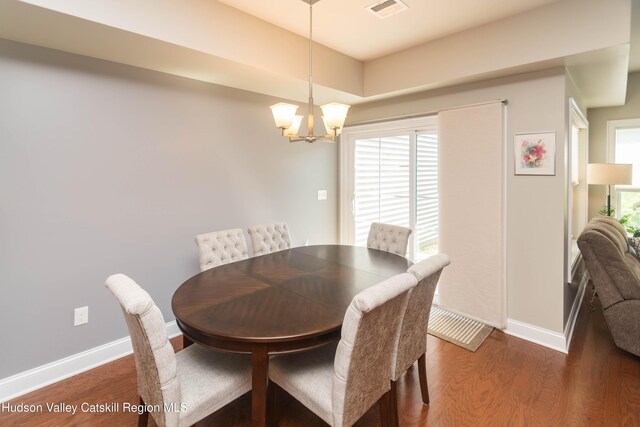 208 Hudson View Ter, Hyde Park, NY 12538 - dining space featuring a chandelier and wood finished floors