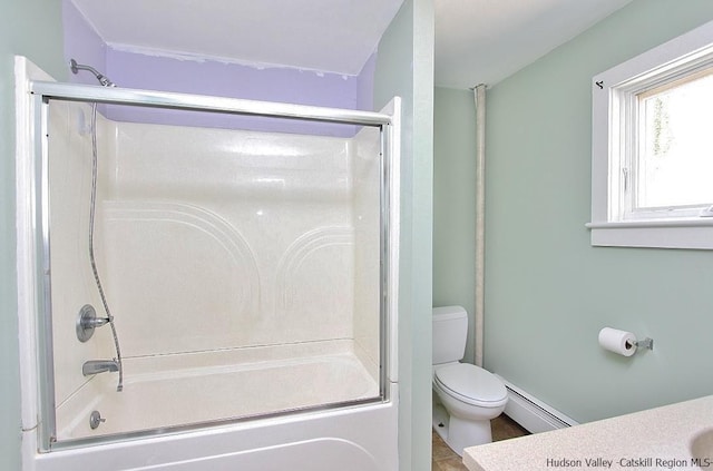 bathroom with a baseboard radiator, toilet, and enclosed tub / shower combo