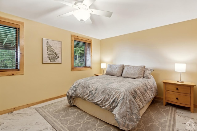 187 Mt Jeffereson Rd, Jefferson, NY 12167 - bedroom with baseboards, marble finish floors, and ceiling fan