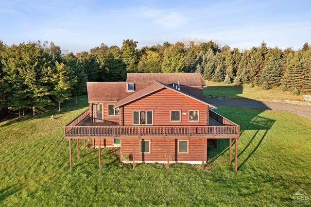 187 Mt Jeffereson Rd, Jefferson, NY 12167 - view of side of home featuring a wooden deck, a lawn, and a forest view