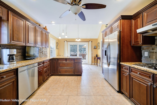 kitchen with ceiling fan, light tile patterned floors, appliances with stainless steel finishes, under cabinet range hood, and lofted ceiling