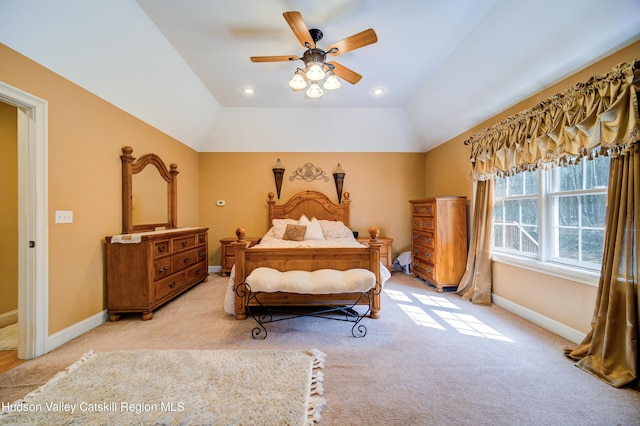 bedroom featuring light carpet, baseboards, vaulted ceiling, and recessed lighting