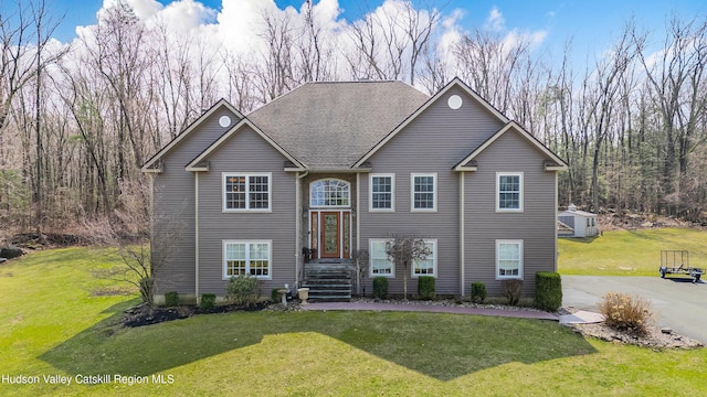 split foyer home featuring a front yard