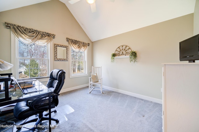 office space with high vaulted ceiling, ceiling fan, baseboards, and carpet
