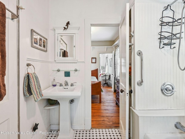 bathroom with separate shower and tub