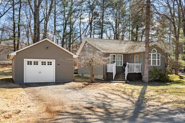 34 Cottonwood Rd, Elizaville, NY 12523 - view of front of property with driveway, an outbuilding, and a garage