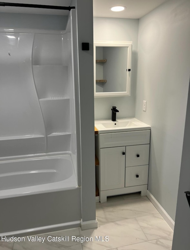 bathroom with shower / tub combination and vanity