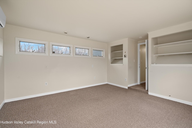 interior space featuring carpet flooring and a wall unit AC