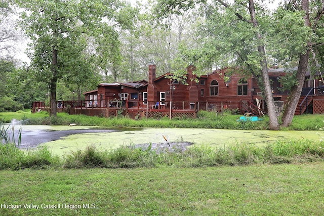 view of yard featuring a wooden deck