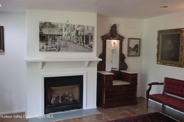 living room featuring a fireplace