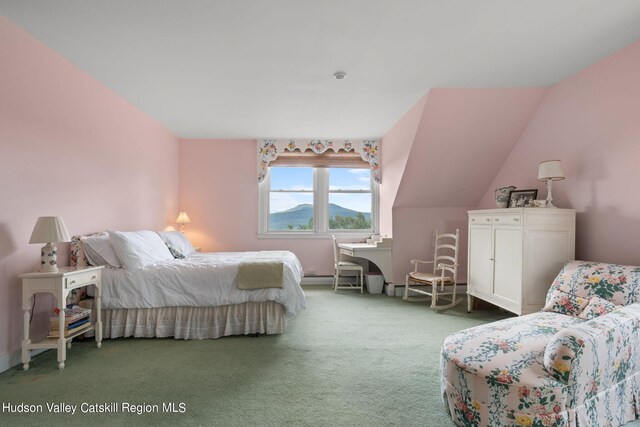 carpeted bedroom with a mountain view and lofted ceiling