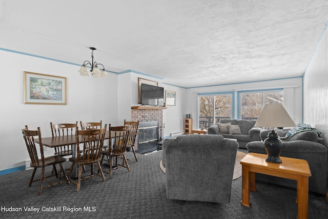 carpeted living area featuring a notable chandelier and a fireplace